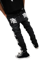 Load image into Gallery viewer, MIXED EMOTION MONOGRAM JEANS